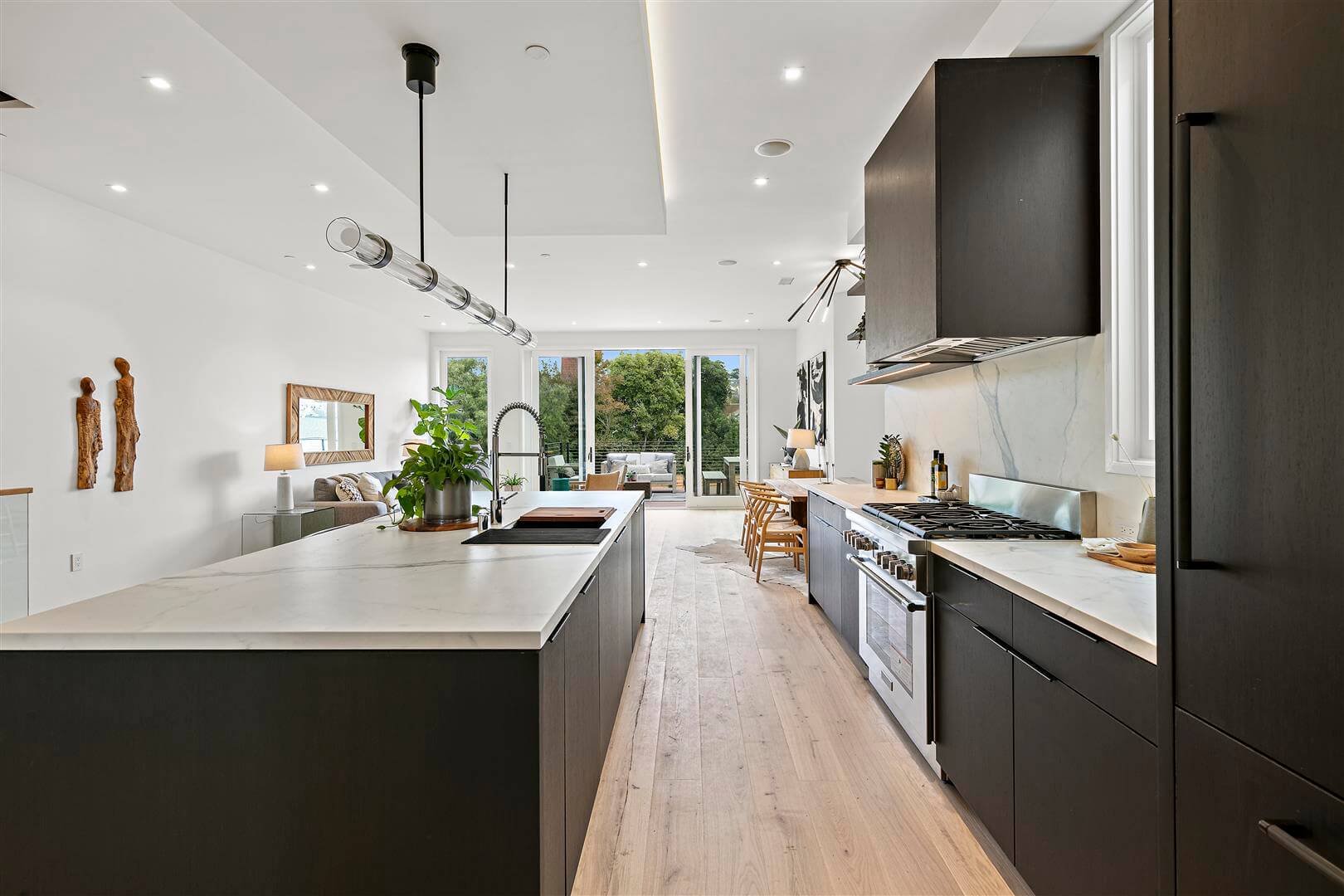 Graphic of a typography specimen showing the alphabet and numerals on top of a dark gray background.