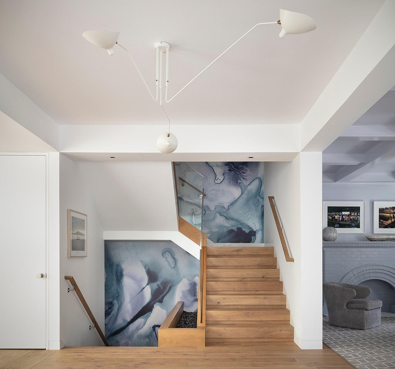 Graphic of a typography specimen showing the alphabet and numerals on top of a dark gray background.