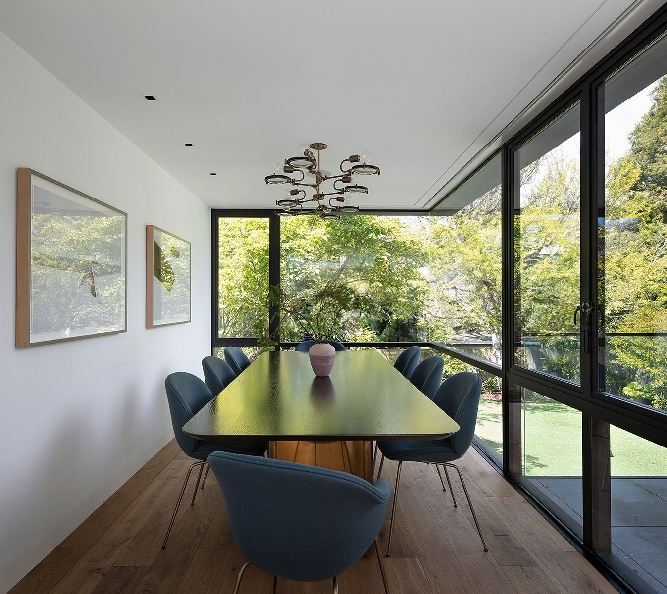 Graphic depicting a hexagonal cropped photo of an interior room design with grid lines along its borders.